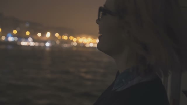 Young Charming Blonde Sails On A Cruise Liner On The River