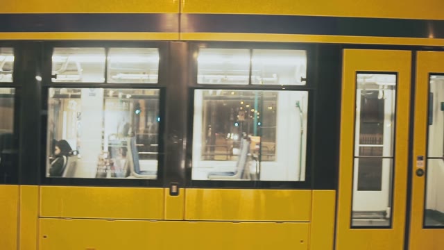 Yellow Tram Rides Through The Streets Of Prague