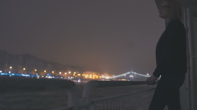 Young Beautiful Blonde At The Side Of A Cruise Ship