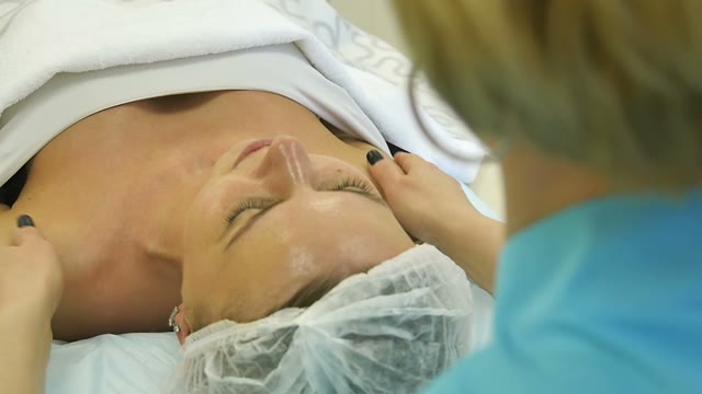 Woman Gown Doing Massage Close-up