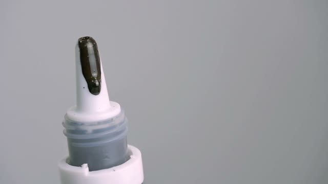 Paint Pouring From A Tube Close-up