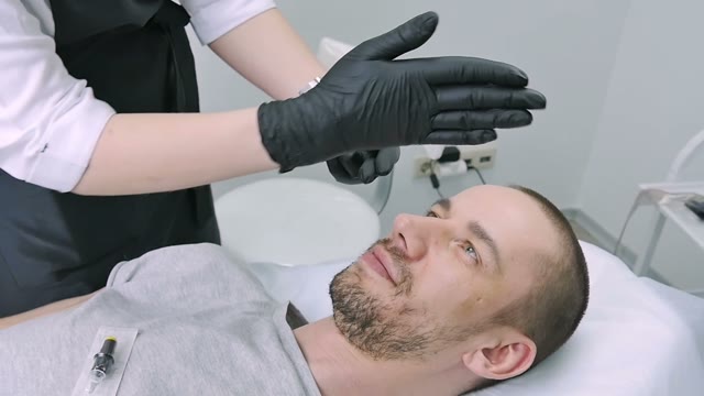Girl Shows Something With Her Hands To Man