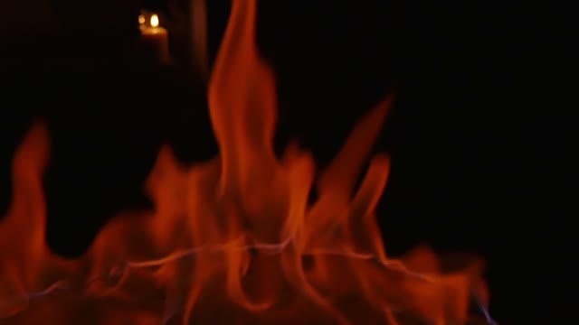 Red Flames In Darkness Close-up