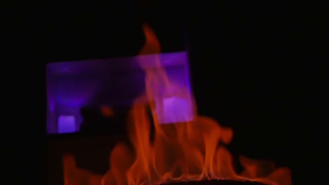 Red Flames In Darkness Close-up