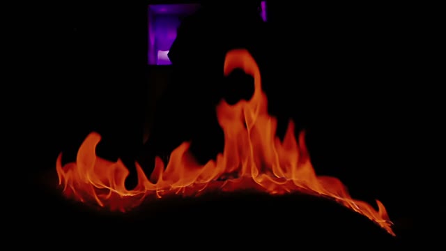Red Flames In Darkness Close-up