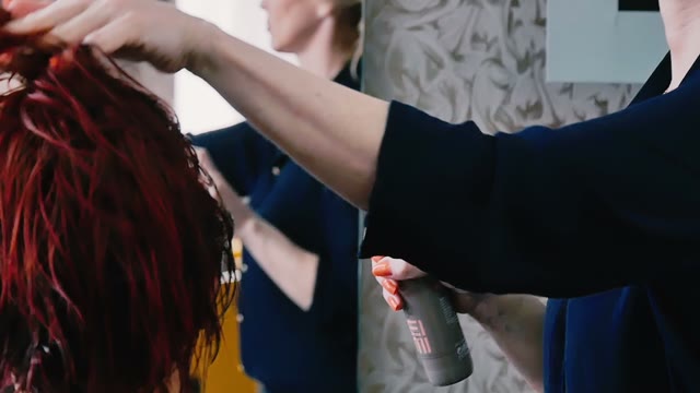 Hairdresser Makes Hair Styling Close-up