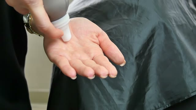 Hairdresser Makes Hair Styling Close-up