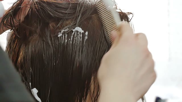 Hairdresser Makes Hair Styling Close-up