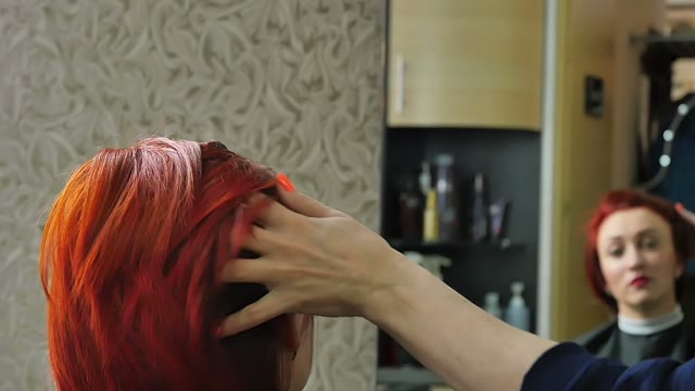 Hairdresser Sprinkles Hair Close-up