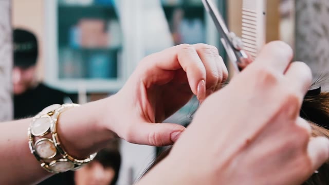 Hairdresser Preparing For Haircut Close-up