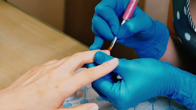 Master Makes A Manicure Close-up