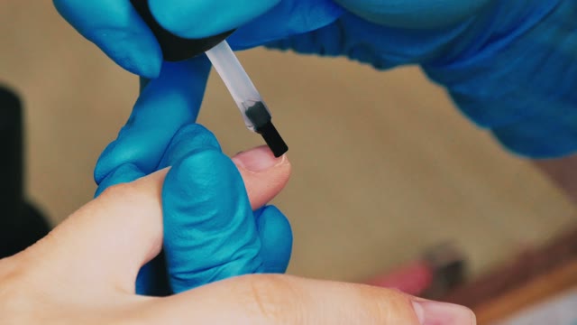 Master Makes A Manicure Close-up