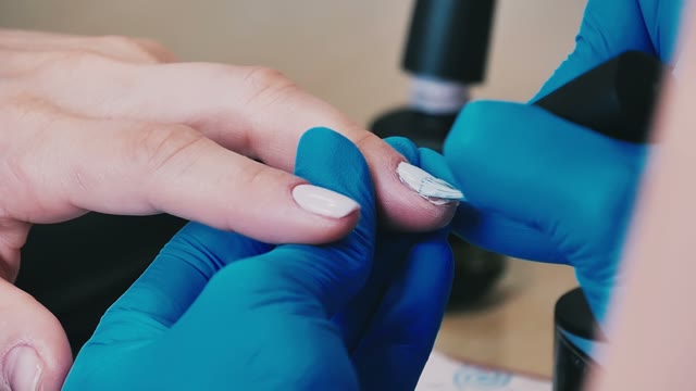 Master Makes A Manicure Close-up