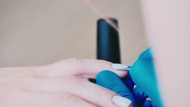 Master Makes A Manicure Close-up