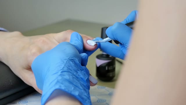 Master Makes A Manicure Close-up