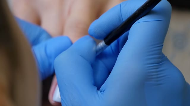 Master Makes A Manicure Close-up