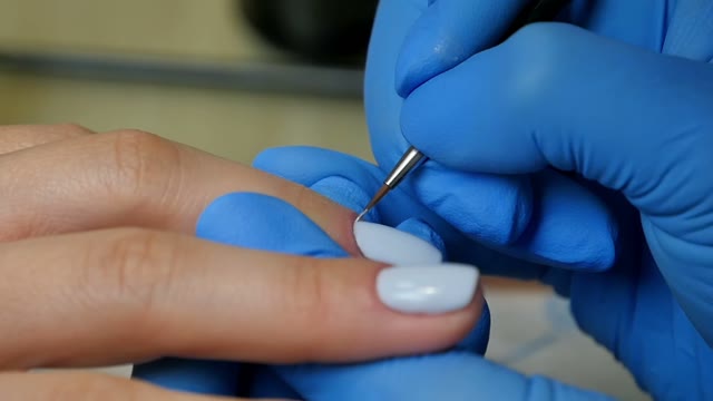 Master Makes A Manicure Close-up