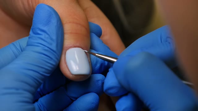 Master Makes A Manicure Close-up