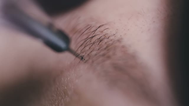 Master Does Tattoo Of Eyebrows Close-up