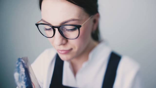 Woman Working With A Tattoo Machine Close-up