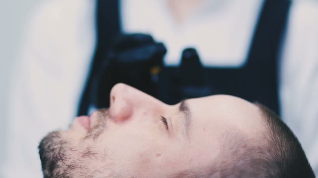 Woman Prepares To Work With A Man Close-up