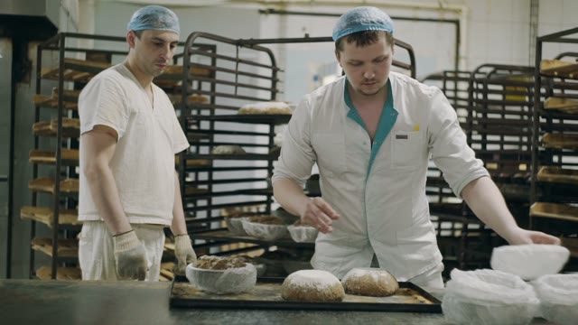 Men Spread Their Bread