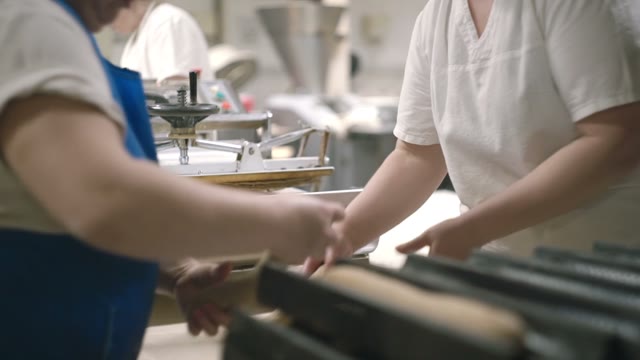 Women Spreads Dough