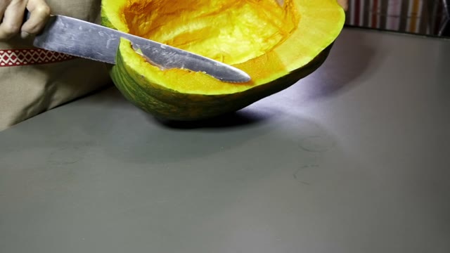 Knife Cuts A Pumpkin