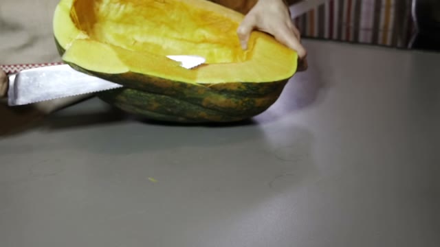 Knife Cuts A Pumpkin Slow Motion