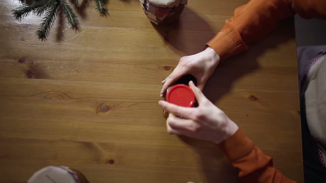 Woman Closes The Jar
