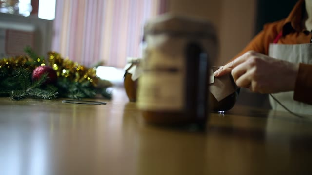 Woman Is Packing A Jar