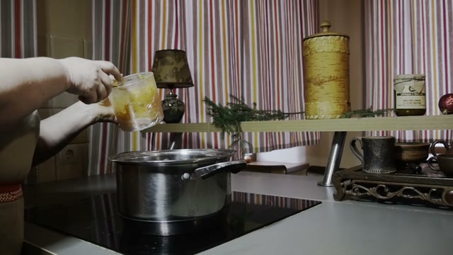 Woman Cooking Pumpkin Soup
