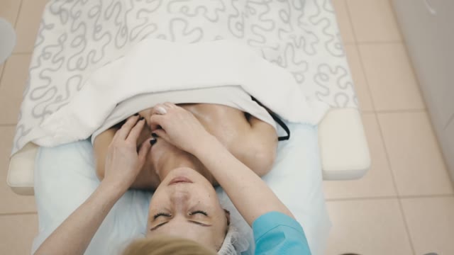 Gentle Massage Of The Breast With The Use Of Spa Creams