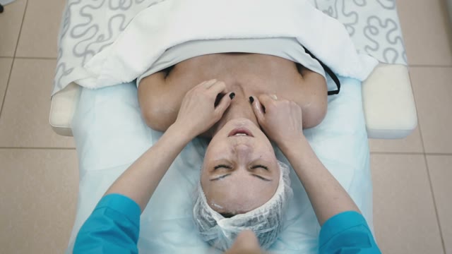 Massage Of The Thoracic And Cervical Parts Of The Body In The Spa Salon