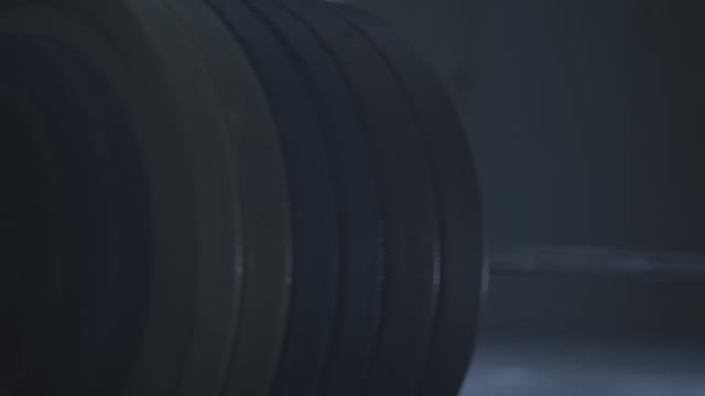Barbell Rests On The Floor