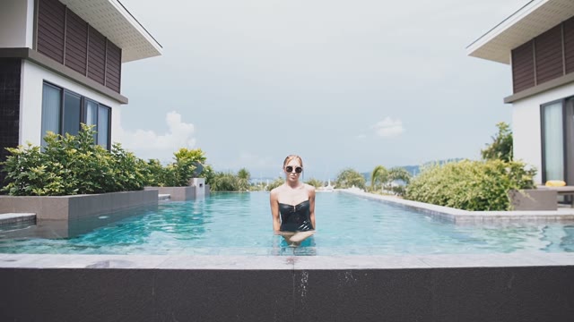 Beautiful Girl Coming Out Of The Pool