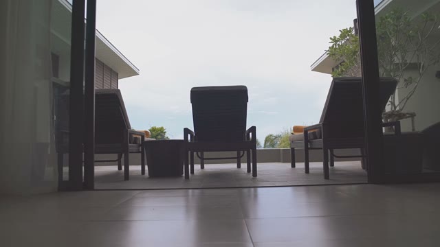 Girl Goes To The Seats By The Pool