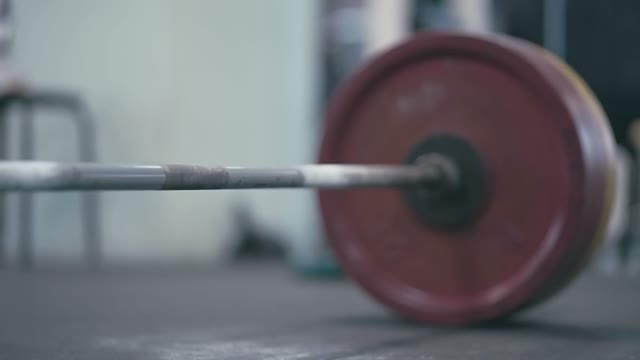 Barbell Rests On The Floor