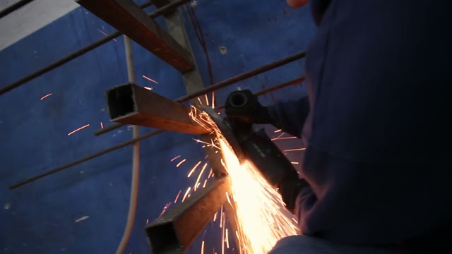 Employee Working A Circular Saw Close-up