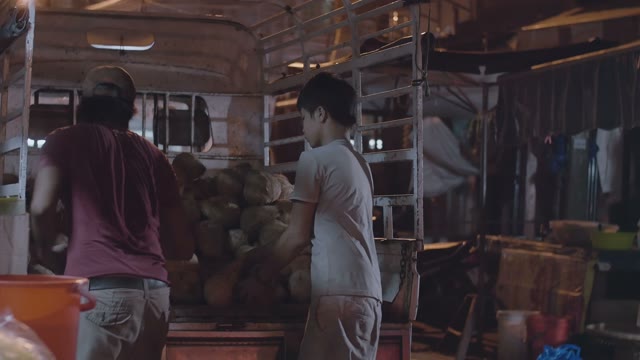 Men Unload Truck