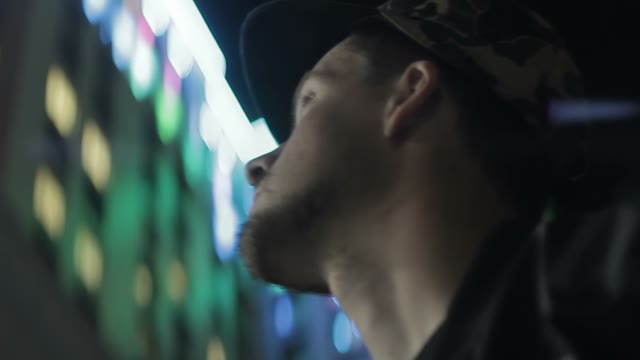 Face Of A Young Man At Night Close-up