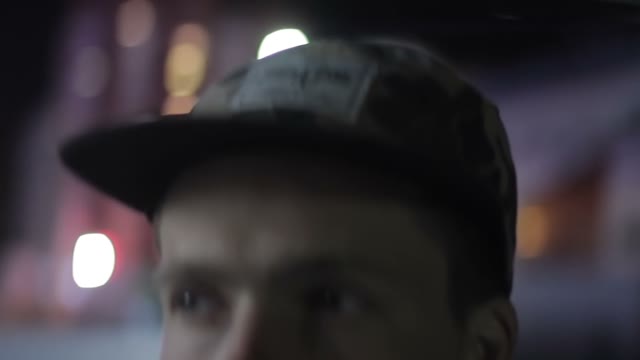 Face Of A Young Man At Night Close-up