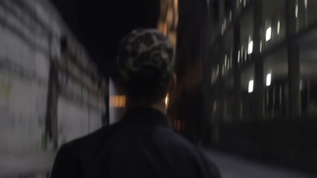 Man Twists A Skateboard Close-up
