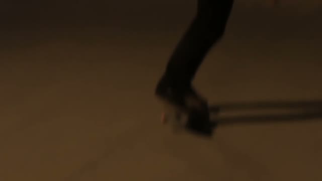 Man Is Riding A Skateboard Close-up