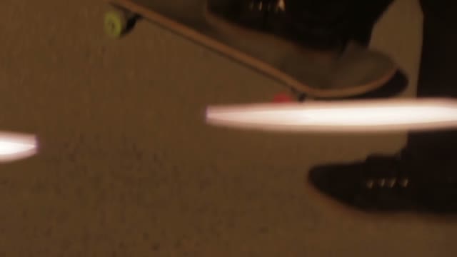 Man Is Riding A Skateboard Close-up