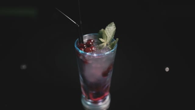 On The Table Is A Scarlet Cocktail