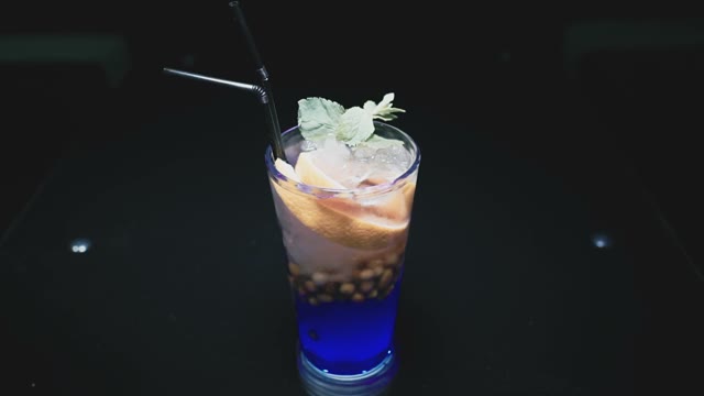 On The Table There Is A Ready Cocktail Of Blue Color