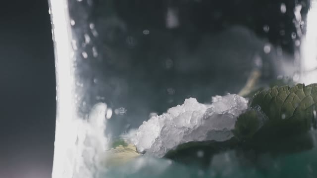 Lot Of Ice In A Shisha Flask With A Mint