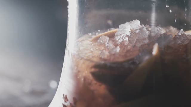 Bulb For The Hookah Is Filled With Cola And Fruit