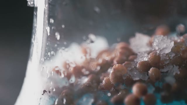 Frozen Sea Buckthorn Berries Lie In A Flask For A Hookah